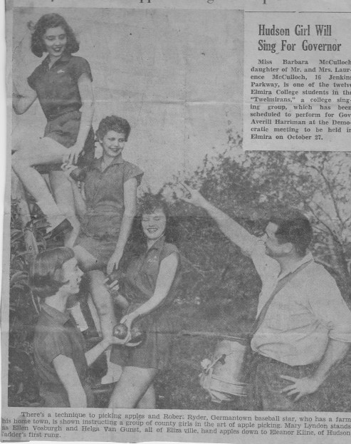 Ellen Vosburgh (Stier) on the apple picking on the ladder's top rung  in 1956.